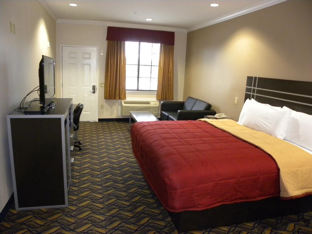 Palace Inn Kingwood Гамбл Номер фото